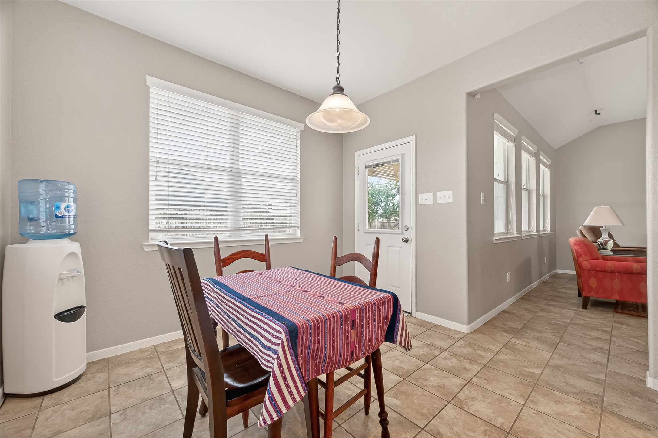 9110 Cavalier Lane Rosenberg, TX 77469 - Photo 16 of 30 a dining room with furniture and window