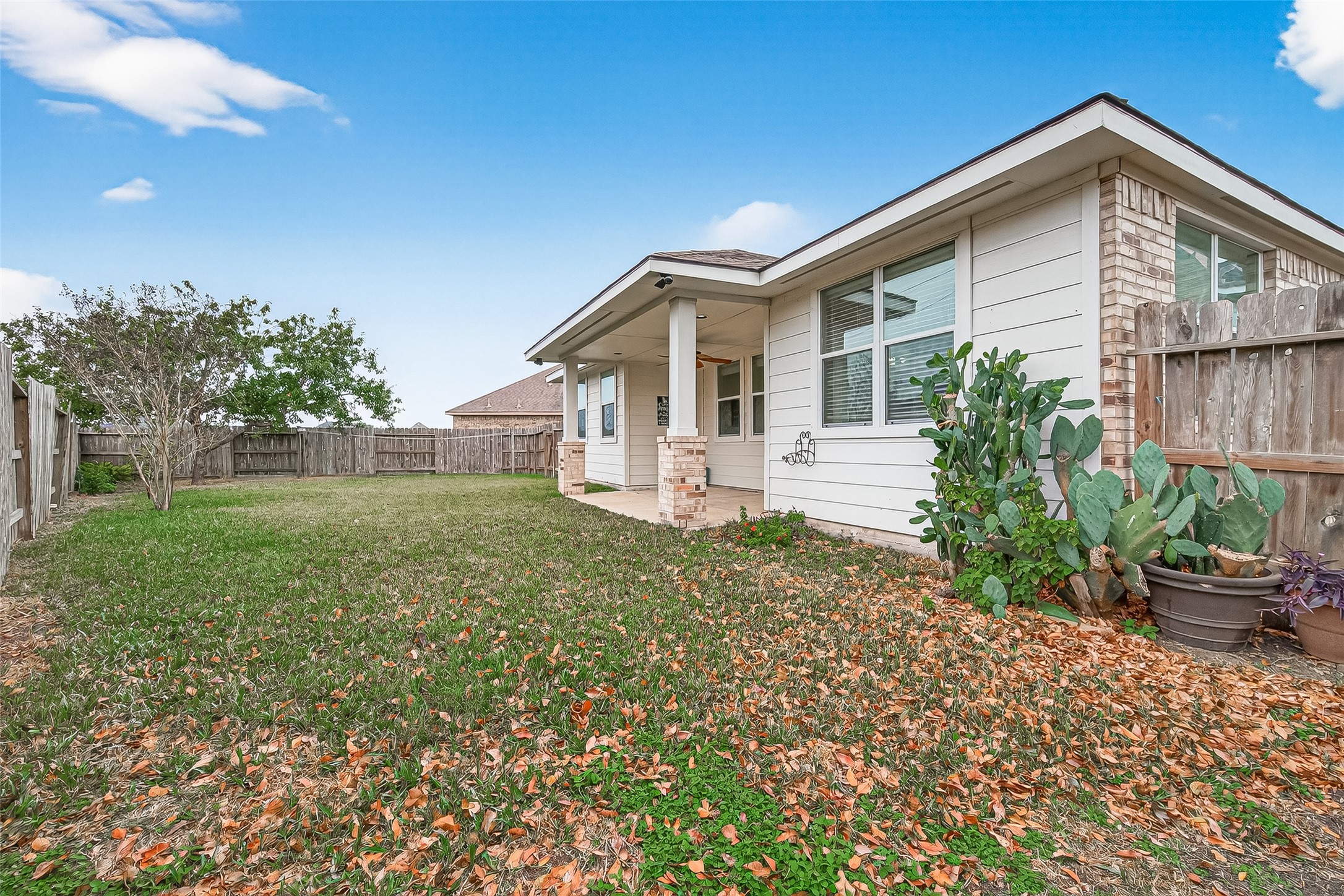 9110 Cavalier Lane Rosenberg, TX 77469 - Photo 30 of 30 a front view of a house with garden