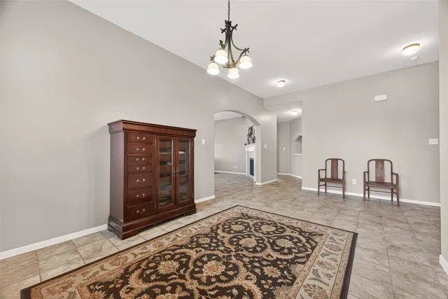 a living room with a rug