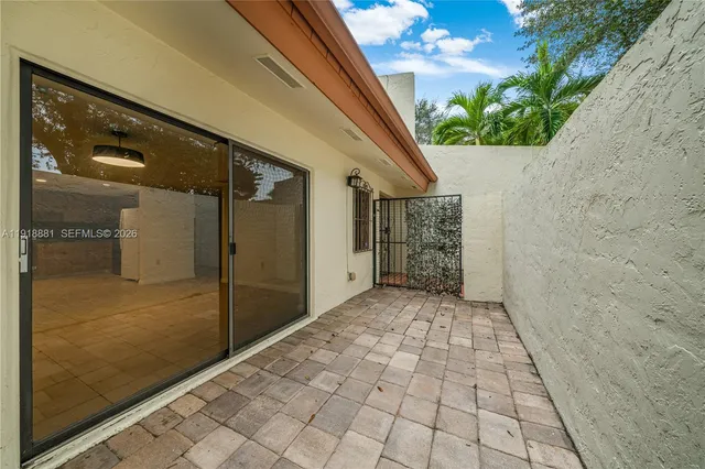 a view of a back yard from a hallway