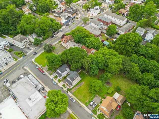 an aerial view of a house with a garden