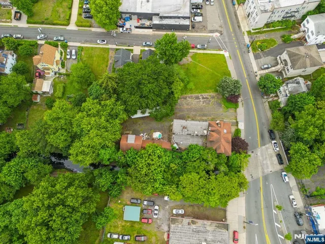 an aerial view of residential house with outdoor space