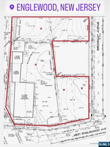 a picture of a book and a white bed