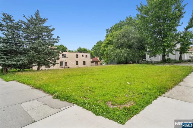a view of a house with a yard porch and sitting area