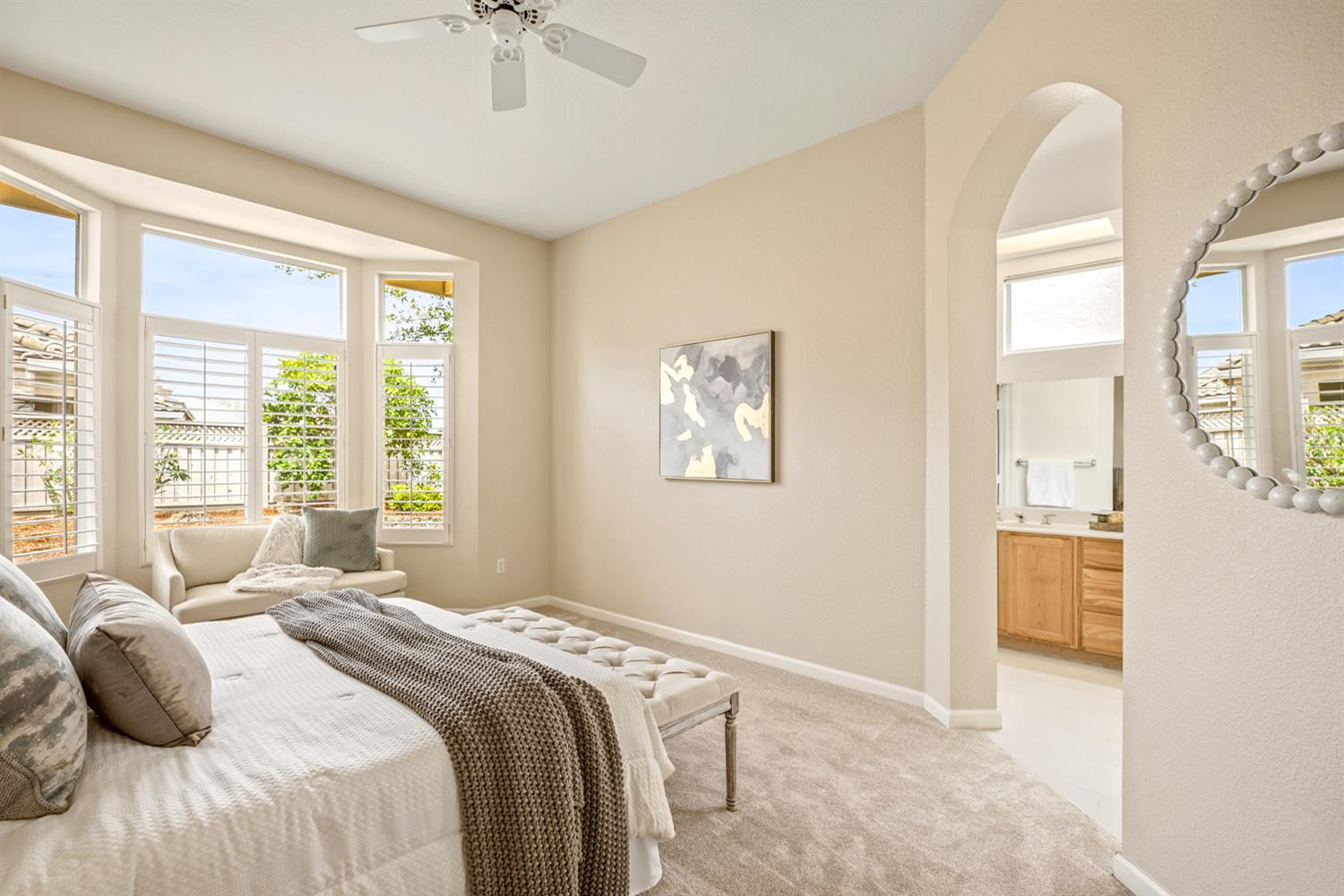 4081 Rose Creek Road Roseville, CA 95747 - Photo 27 of 52 a bedroom with a bed and a chandelier