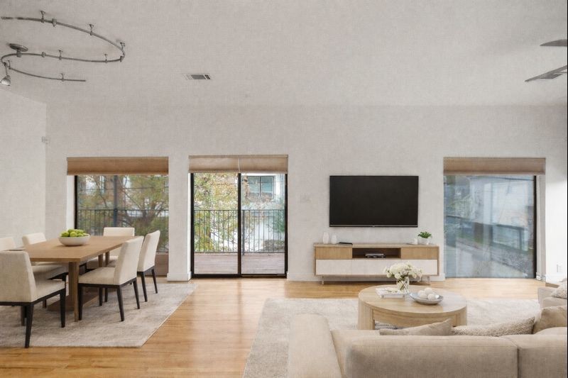 4501 Eigel Street, Unit A Houston, TX 77007 - Photo 2 of 38 Bright and airy living room with seamless flow to dining and kitchen areas. *Picture is virtually staged.