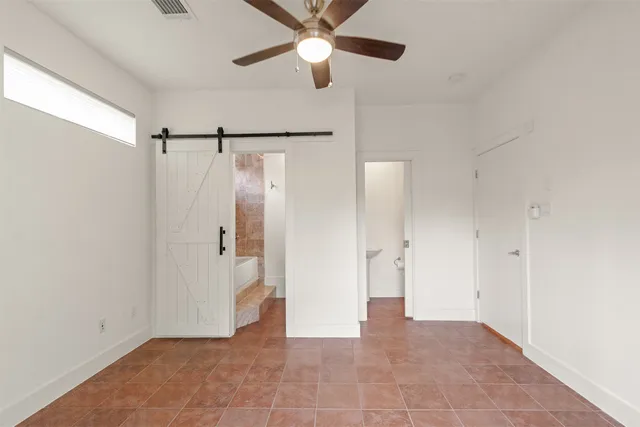 a bathroom with a tub sink a mirror and shower