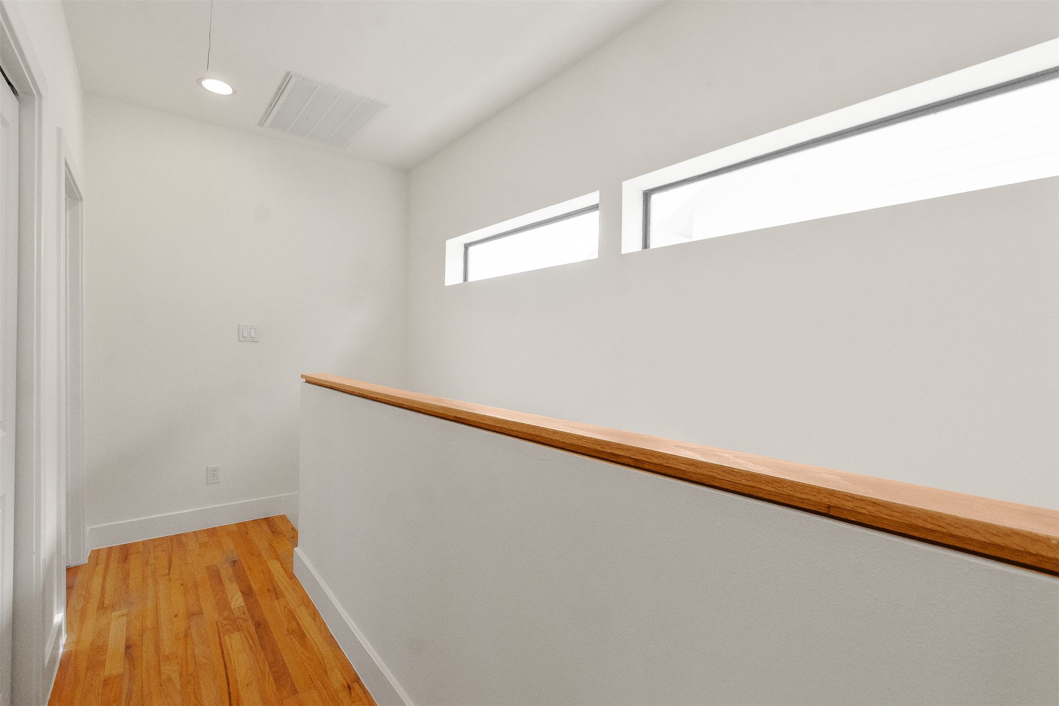 4501 Eigel Street, Unit A Houston, TX 77007 - Photo 30 of 38 Convenient laundry area located to the left, on the third floor in between the primary and secondary bedroom.