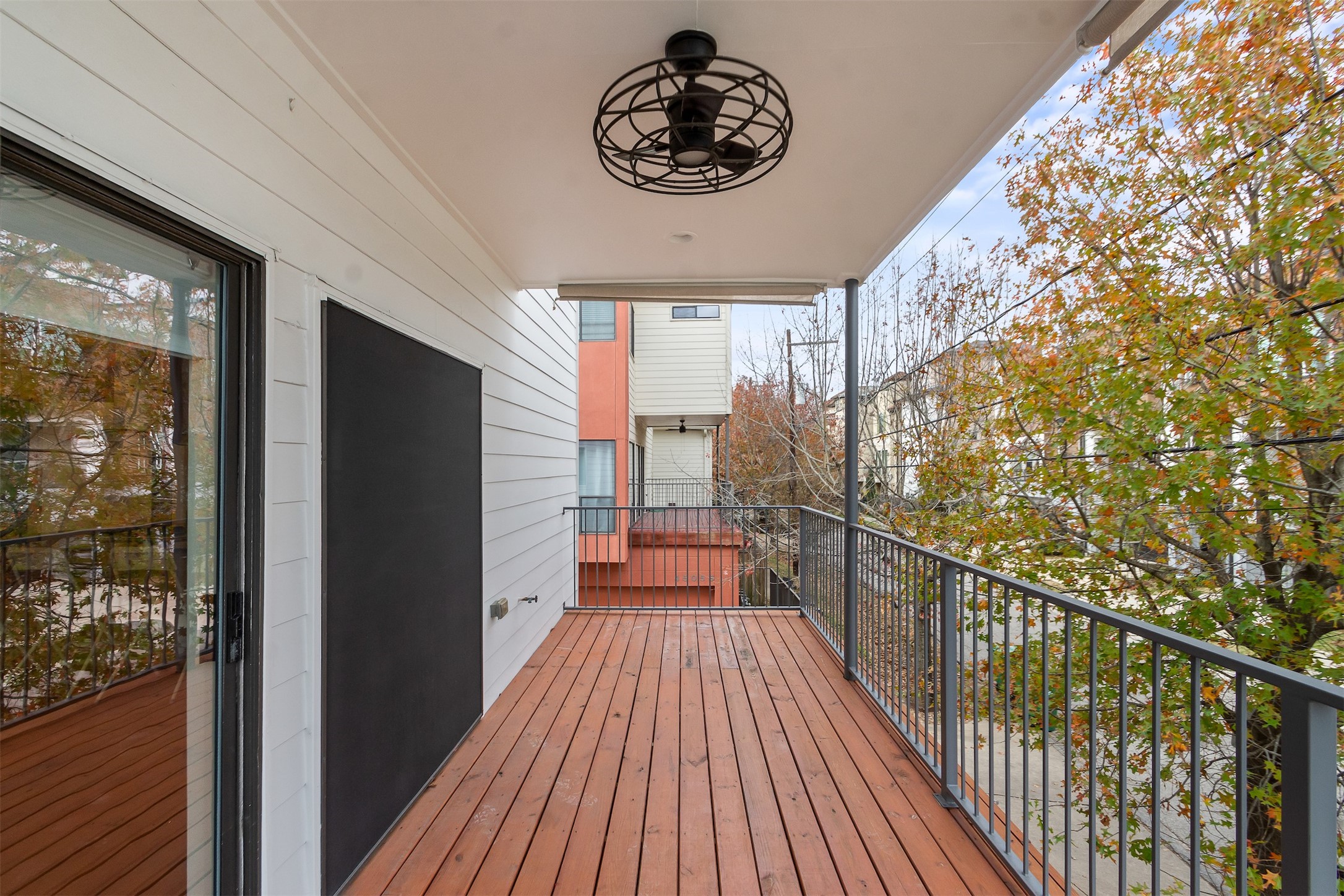 4501 Eigel Street, Unit A Houston, TX 77007 - Photo 8 of 38 Large second-floor deck extending the living space, ideal for outdoor dining or relaxing.