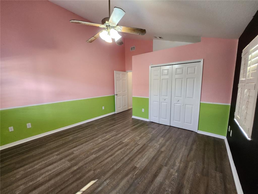 23104 Rountree Avenue Port Charlotte, FL 33980 - Photo 23 of 41 a view of room with window and hardwood floor
