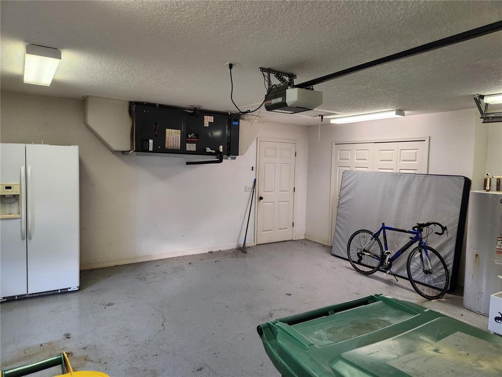 23104 Rountree Avenue Port Charlotte, FL 33980 - Photo 35 of 41 a view of a garage with furniture