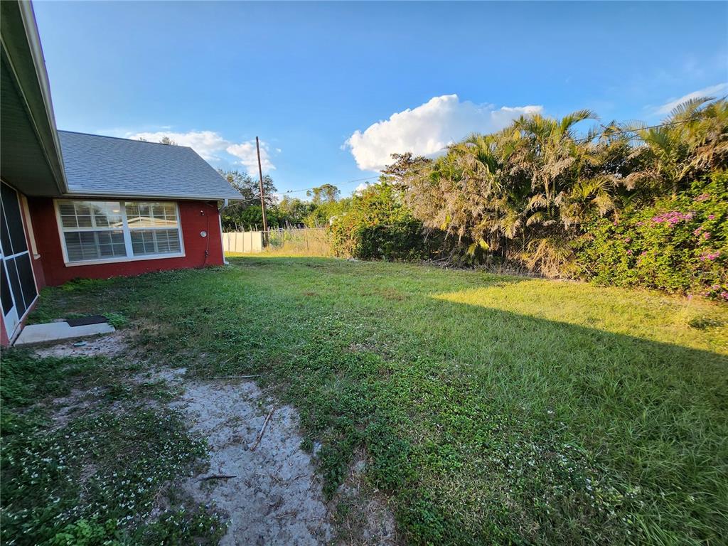 23104 Rountree Avenue Port Charlotte, FL 33980 - Photo 39 of 41 a view of a backyard
