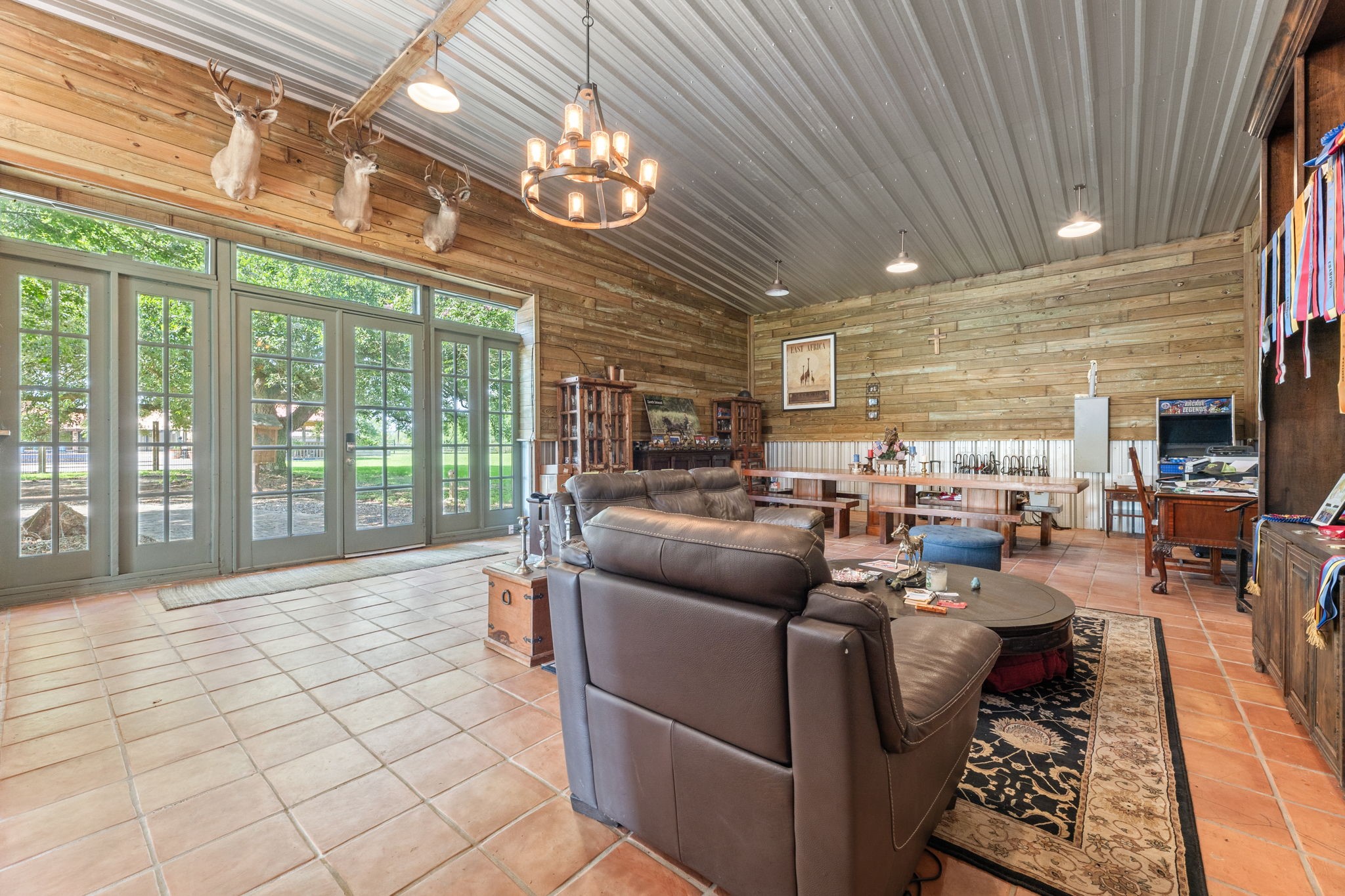 1226 County Road 45 Angleton, TX 77515 - Photo 23 of 44 a living room with furniture and a large window