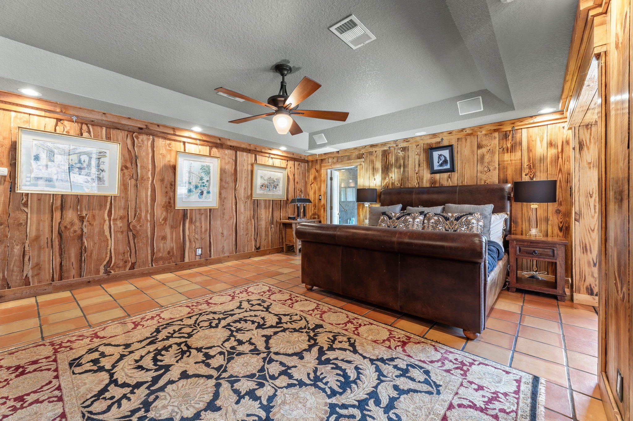 1226 County Road 45 Angleton, TX 77515 - Photo 30 of 44 a living room with a couch and a rug