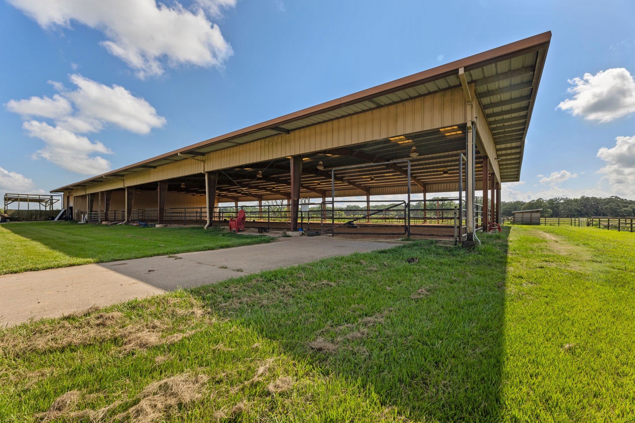 1226 County Road 45 Angleton, TX 77515 - Photo 43 of 44 a view of a house with a backyard