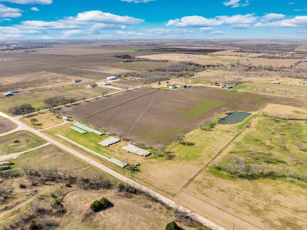 1920 Moseley Road Ennis, TX 75119 - Photo 14 of 19 a view of an ocean and beach