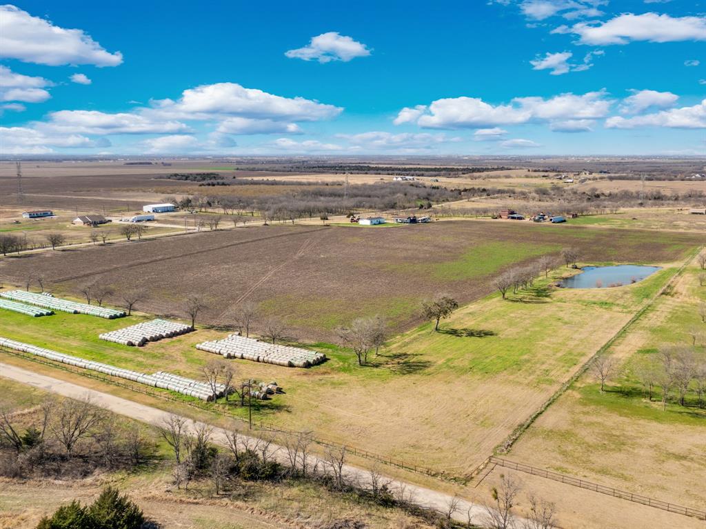 1920 Moseley Road Ennis, TX 75119 - Photo 15 of 19 a view of an ocean and beach
