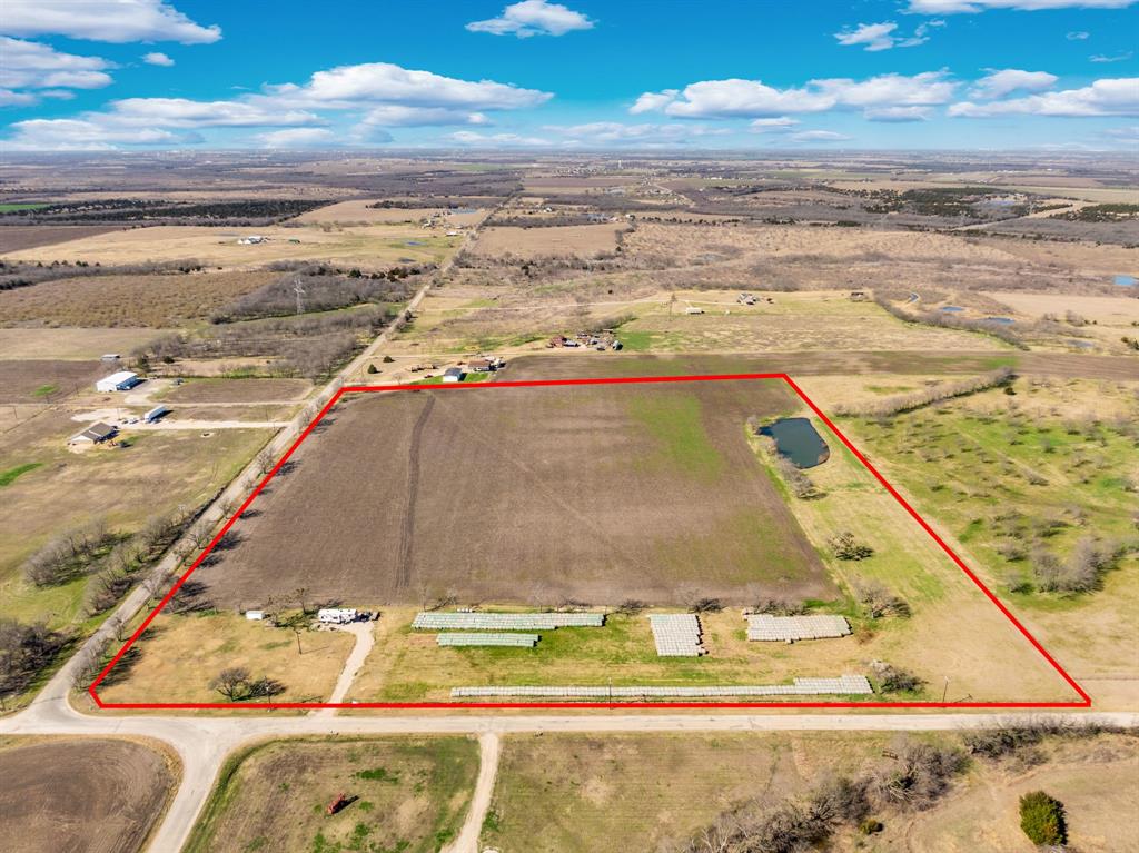 1920 Moseley Road Ennis, TX 75119 - Photo 2 of 19 a view of a ocean view