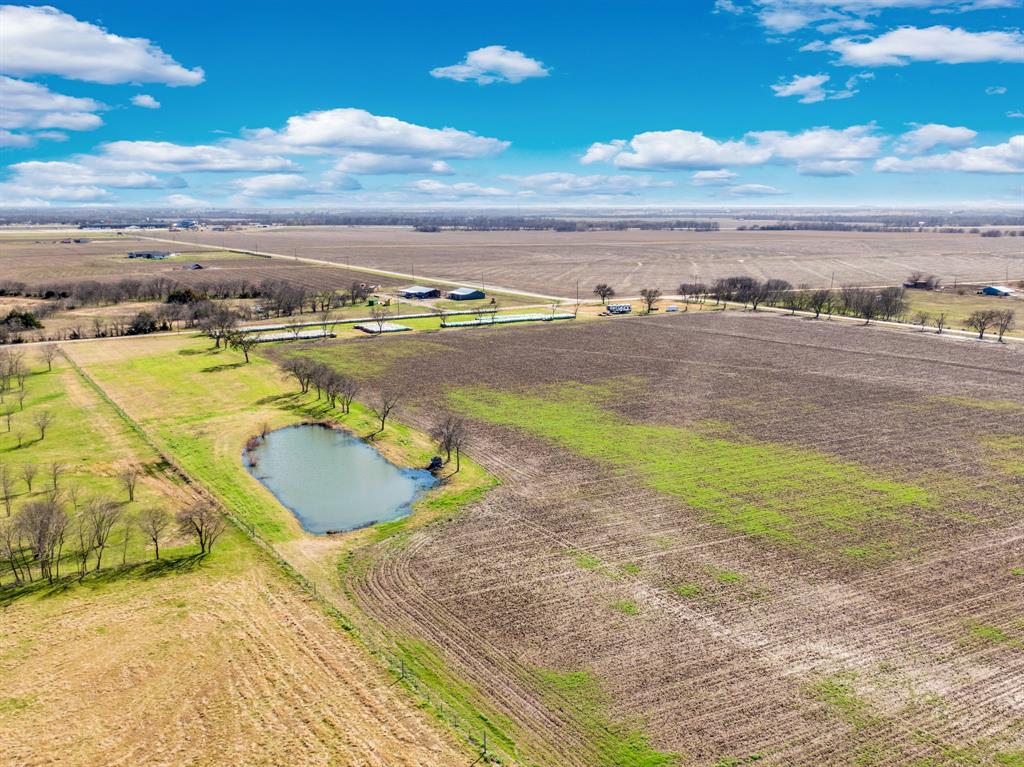 1920 Moseley Road Ennis, TX 75119 - Photo 5 of 19 a view of a lake with a mountain
