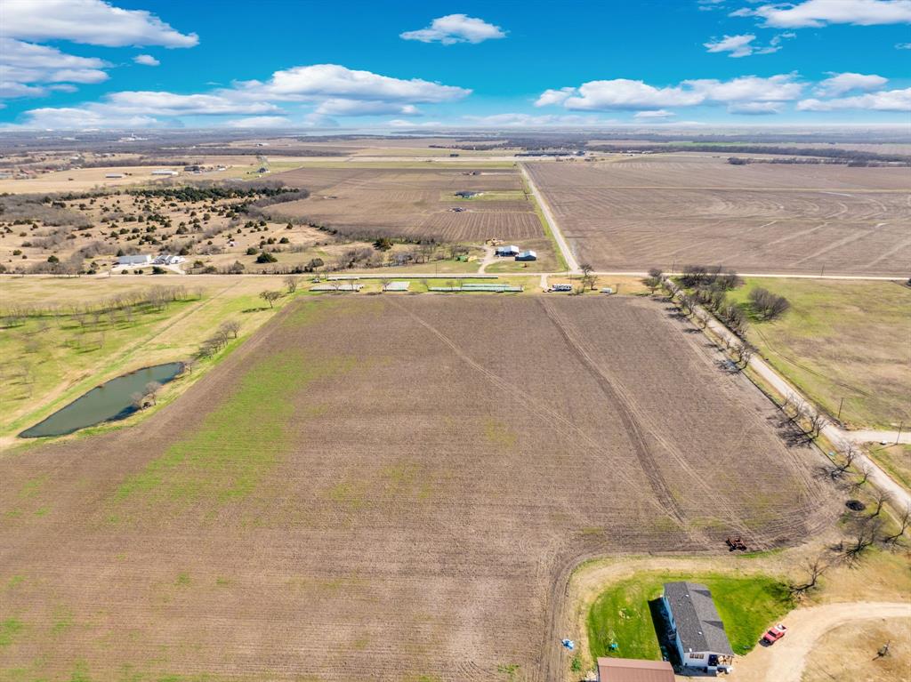 1920 Moseley Road Ennis, TX 75119 - Photo 7 of 19 a view of an ocean and beach