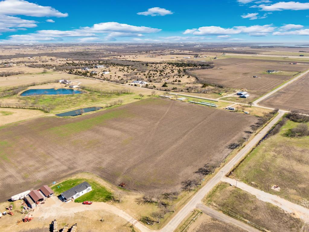 1920 Moseley Road Ennis, TX 75119 - Photo 8 of 19 a view of an ocean and beach
