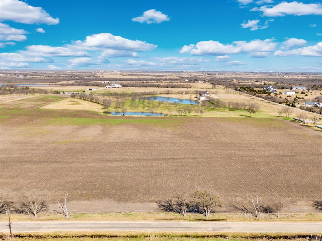 1920 Moseley Road Ennis, TX 75119 - Photo 10 of 19 a view of an ocean and beach