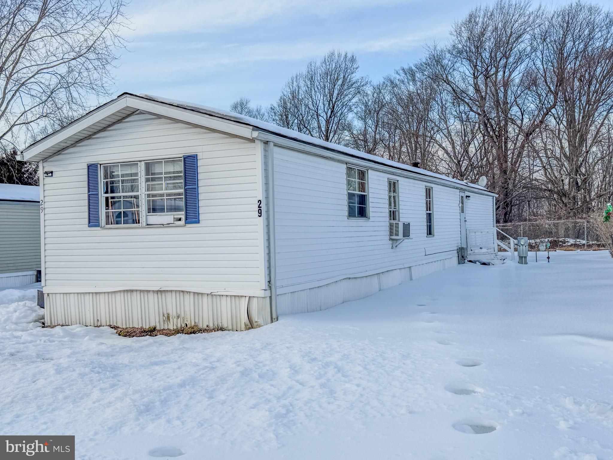 29 West Reybold Drive, Unit 29 Middletown, DE 19709 - Photo 10 of 11 a view of a house with a yard