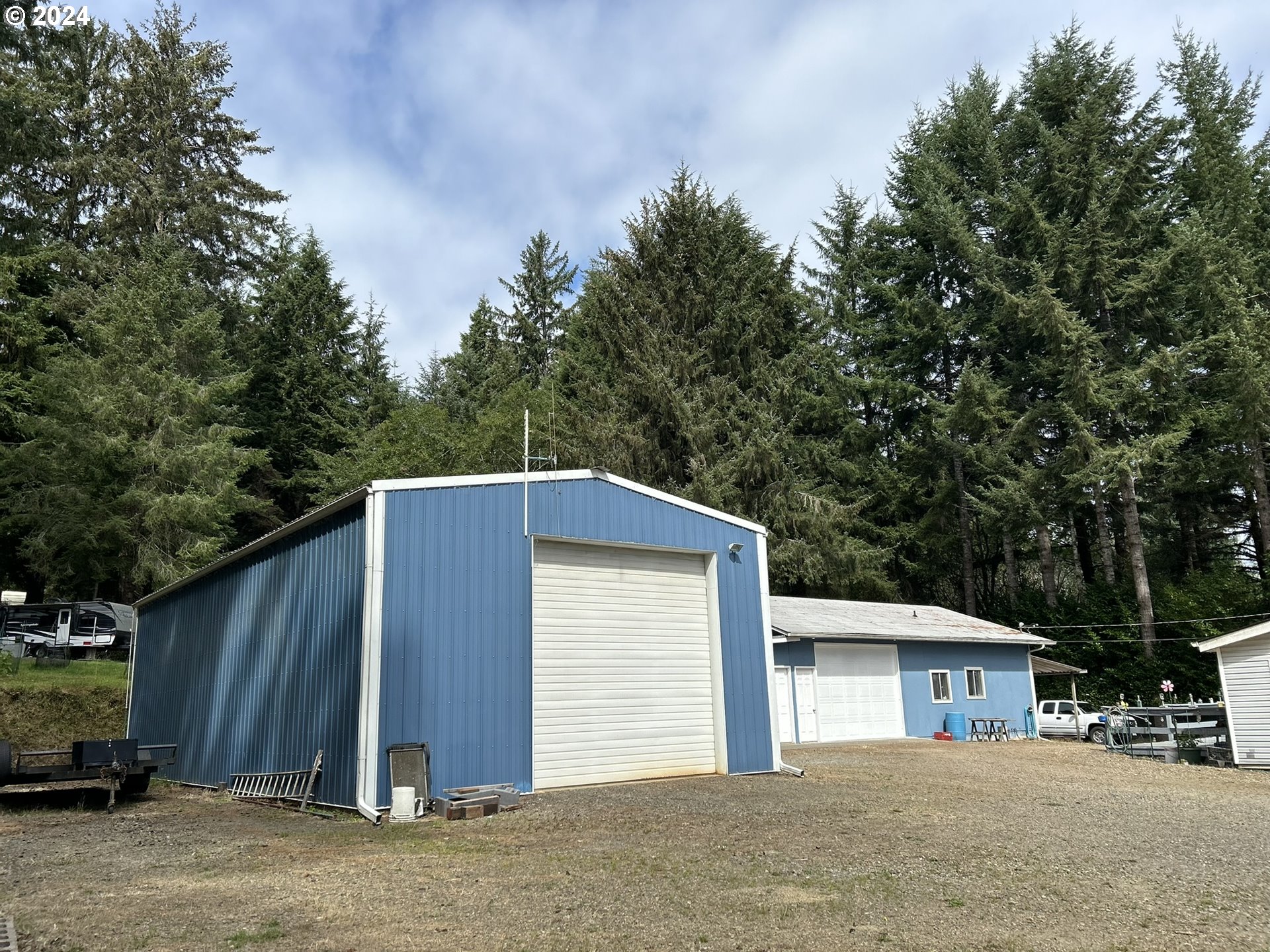 5391 Buckskin Bob Road Florence, OR 97439 - Photo 3 of 42 a house view with a outdoor space