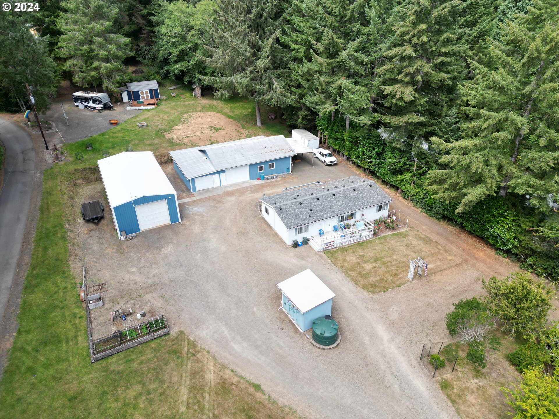5391 Buckskin Bob Road Florence, OR 97439 - Photo 40 of 42 an aerial view of a house with outdoor space