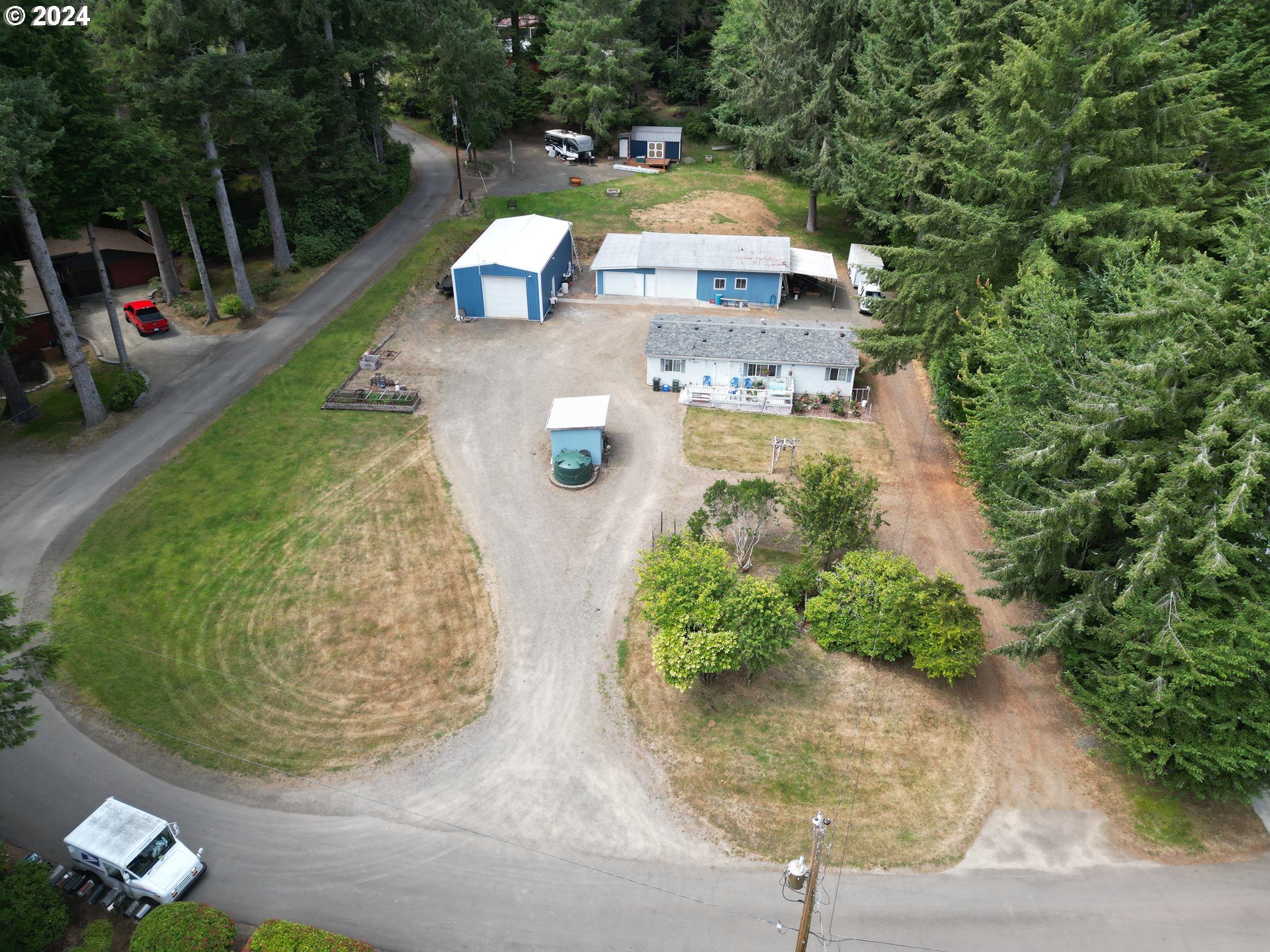 5391 Buckskin Bob Road Florence, OR 97439 - Photo 41 of 42 a view of a swimming pool with a patio