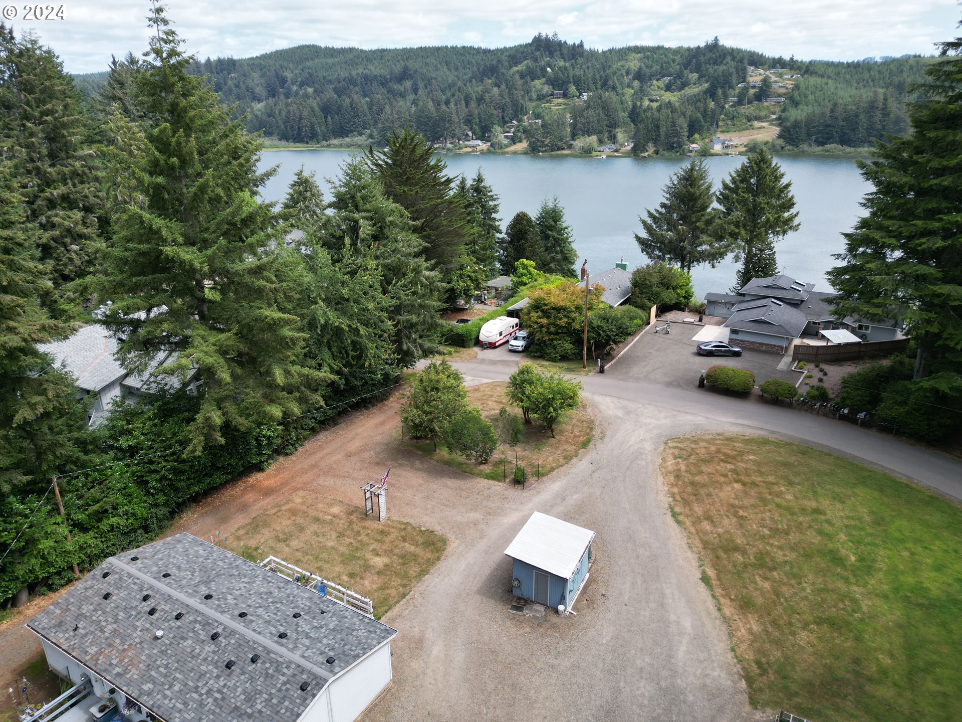 5391 Buckskin Bob Road Florence, OR 97439 - Photo 5 of 42 a view of a wooden bridge