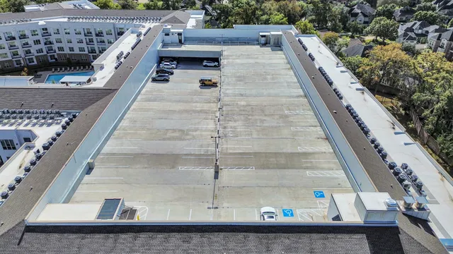a kitchen with stainless steel appliances a sink stove refrigerator and cabinets