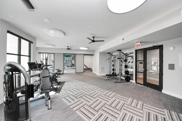 a white refrigerator freezer sitting in a kitchen