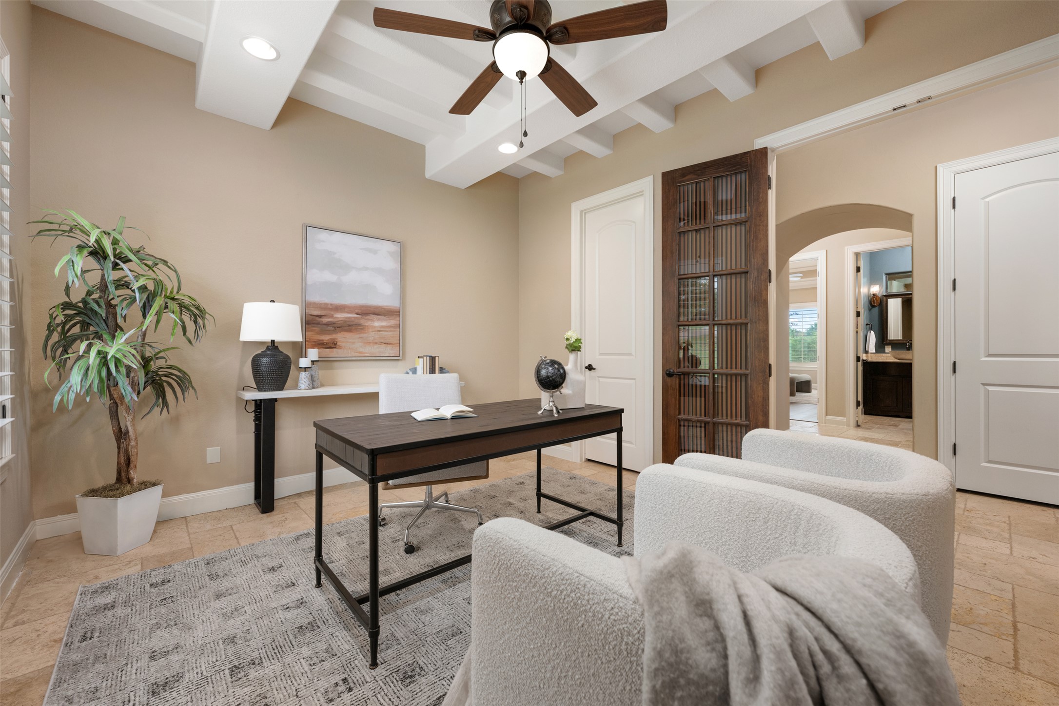 1102 Paw Print Leander, TX 78641 - Photo 25 of 40 This room features a high ceiling with exposed beams, a ceiling fan, and recessed lighting