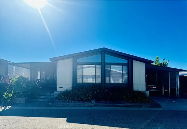 a house view with a garden space