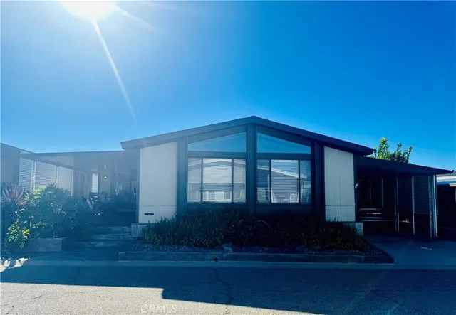 a house view with a garden space
