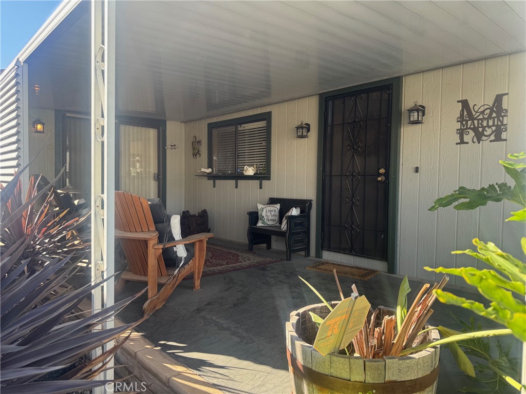 4133 West Wilson Street, Unit 169 Banning, CA 92220 - Photo 24 of 37 a living room with furniture