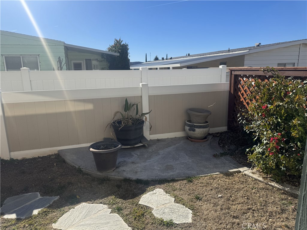 4133 West Wilson Street, Unit 169 Banning, CA 92220 - Photo 30 of 37 a view of a terrace with plants