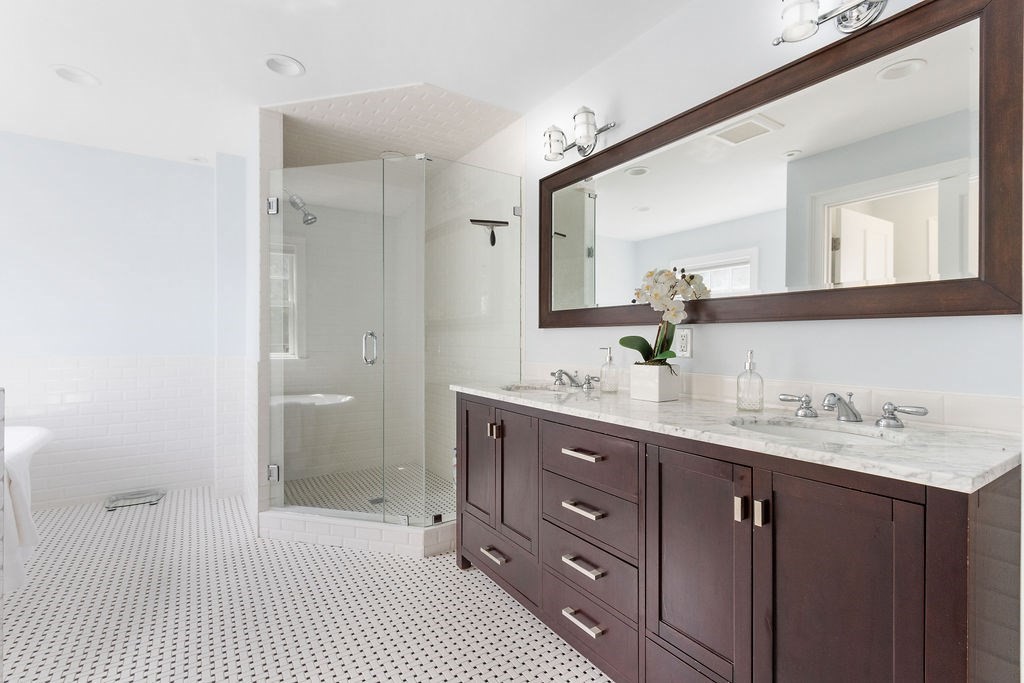 5 Mayflower Road Needham, MA 02492 - Photo 12 of 30 a bathroom with a sink double vanity granite and a mirror