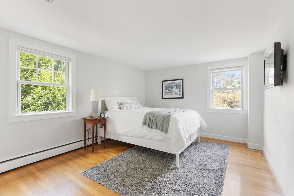 5 Mayflower Road Needham, MA 02492 - Photo 16 of 30 a bed room with a bed and a window