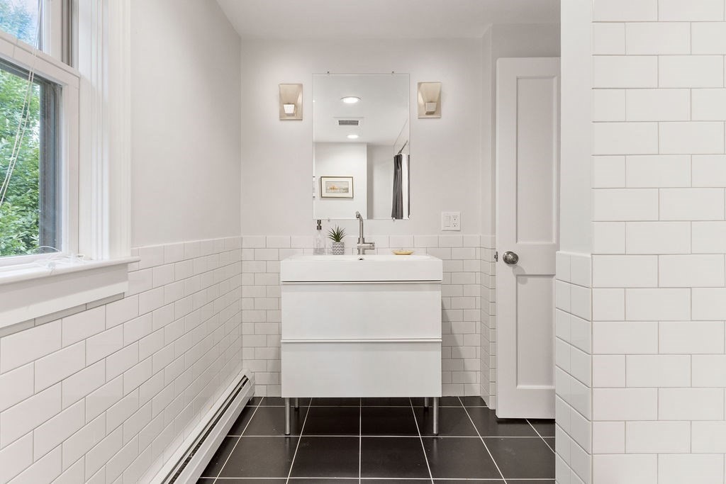 5 Mayflower Road Needham, MA 02492 - Photo 18 of 30 a bathroom with a sink toilet and shower