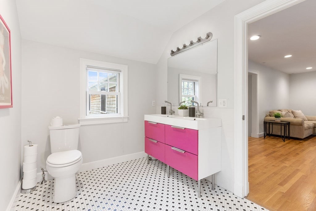 5 Mayflower Road Needham, MA 02492 - Photo 22 of 30 a bathroom with a toilet a sink and a mirror