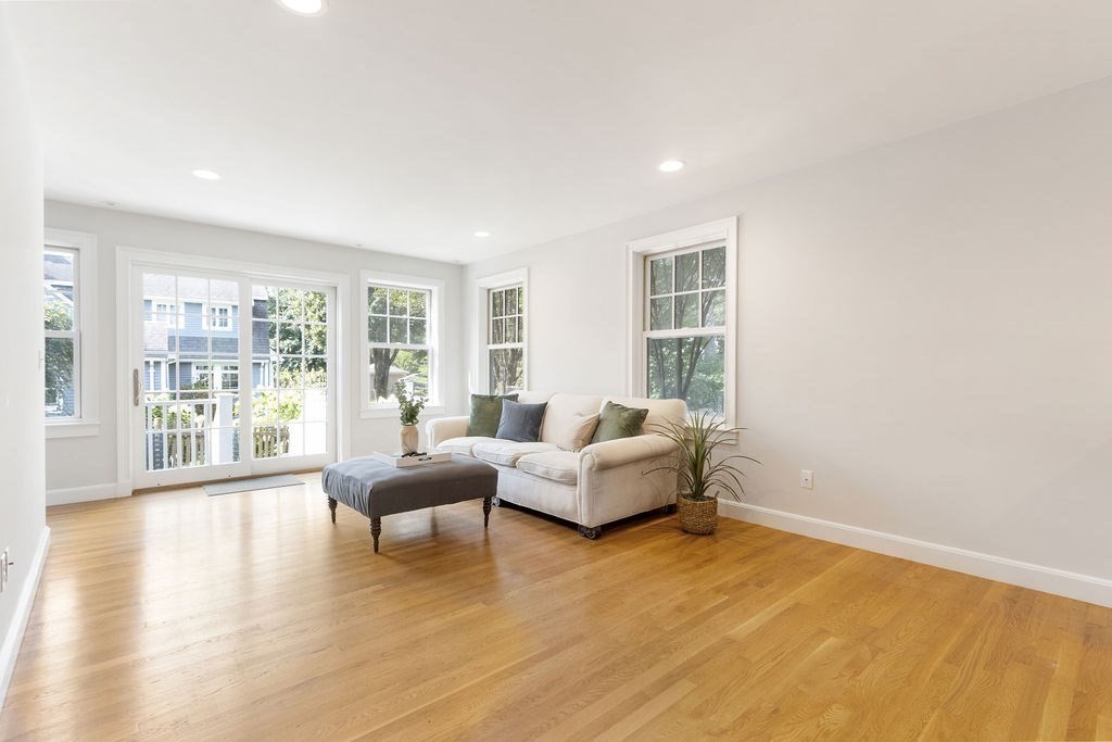 5 Mayflower Road Needham, MA 02492 - Photo 25 of 30 a living room with furniture and large windows