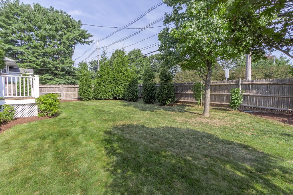 5 Mayflower Road Needham, MA 02492 - Photo 29 of 30 a view of a backyard with a small cabin
