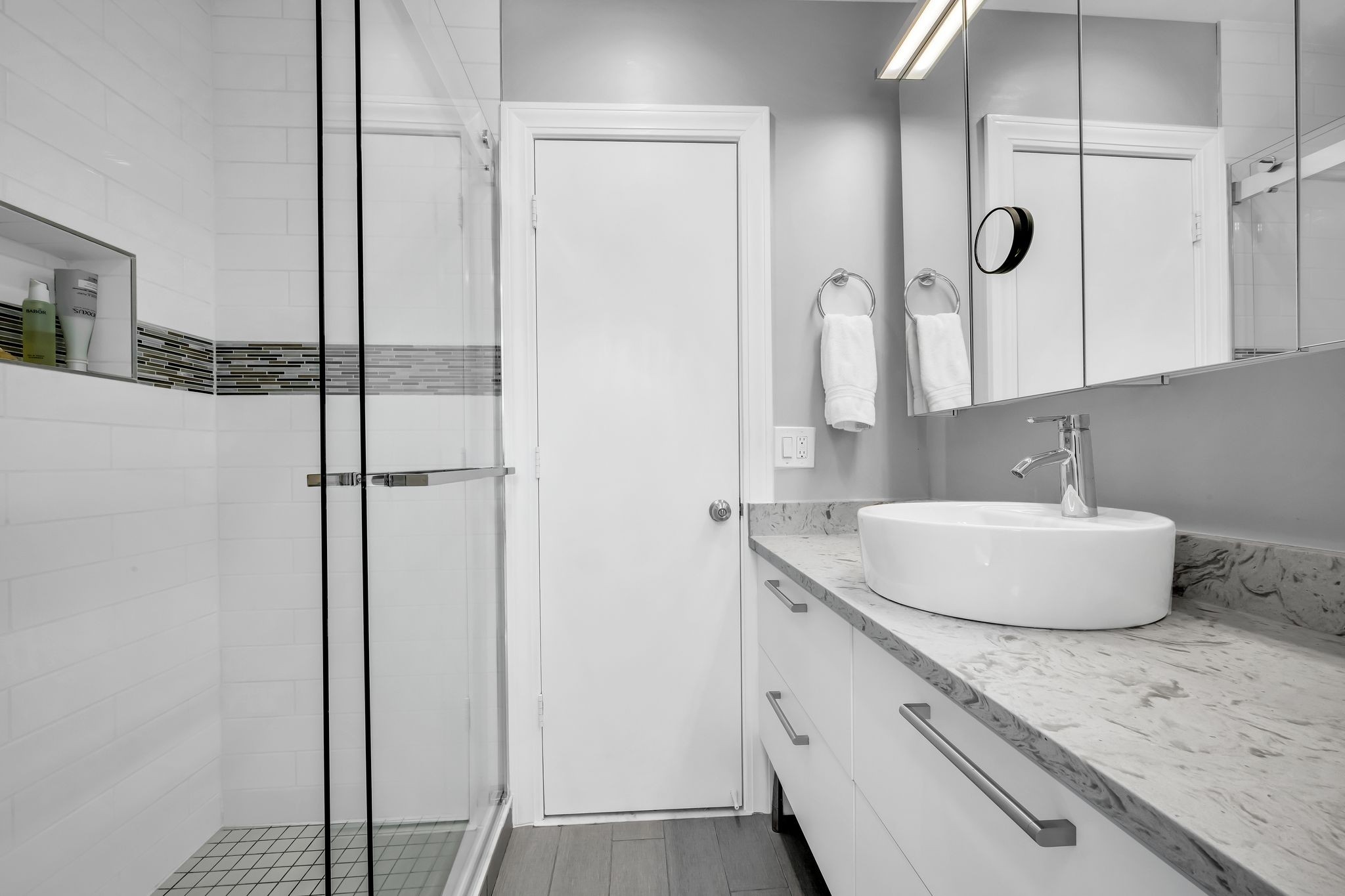 694 Timber Lane Nashville, TN 37215 - Photo 24 of 30 a bathroom with a granite countertop sink a mirror and shower