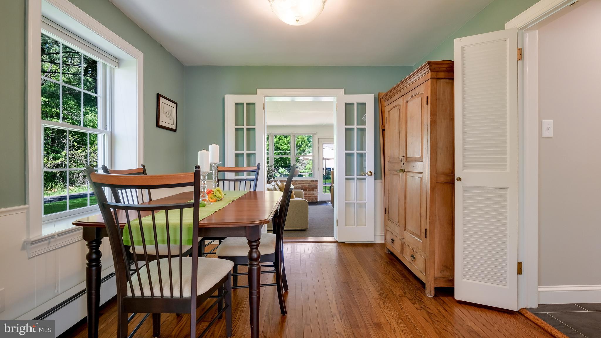 235 North Clinton Street Doylestown, PA 18901 - Photo 11 of 55 a view of a dining room with furniture window and wooden floor