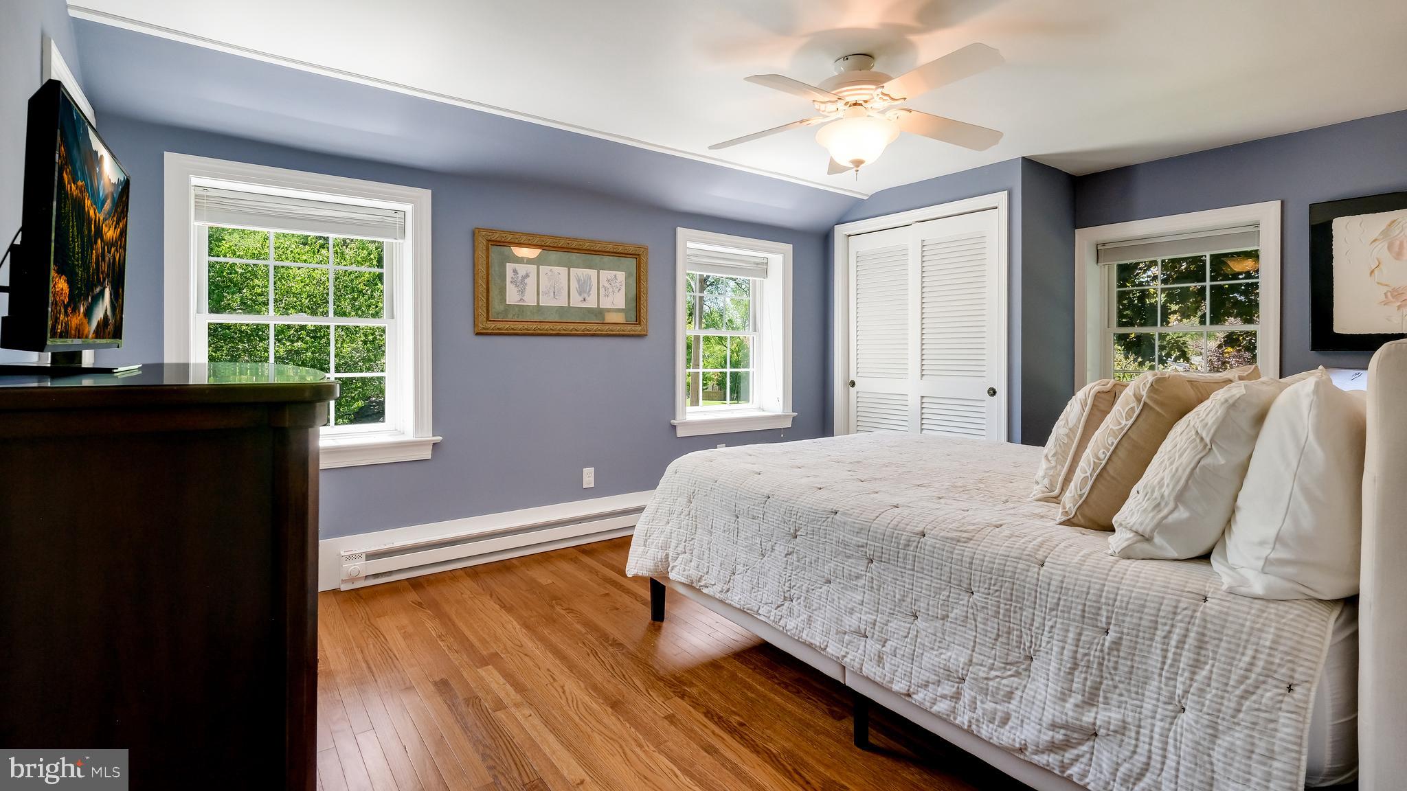 235 North Clinton Street Doylestown, PA 18901 - Photo 35 of 55 a bedroom with a bed and a window