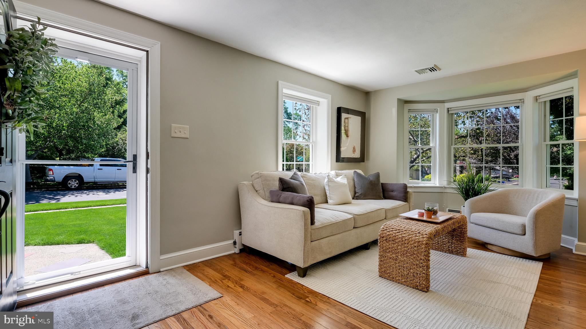 235 North Clinton Street Doylestown, PA 18901 - Photo 5 of 55 a living room with furniture and a large window