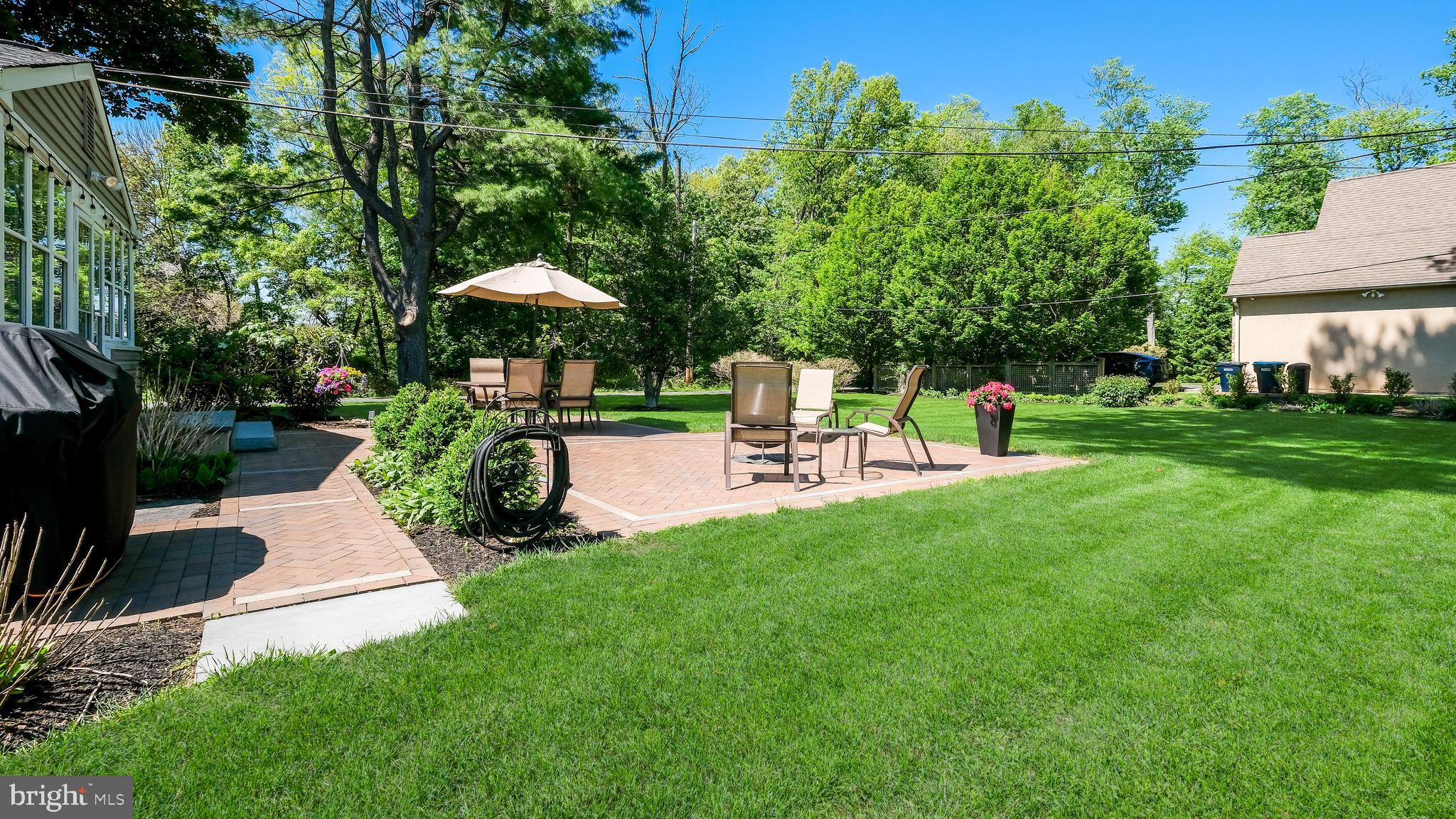 235 North Clinton Street Doylestown, PA 18901 - Photo 52 of 55 a view of a garden with an outdoor seating