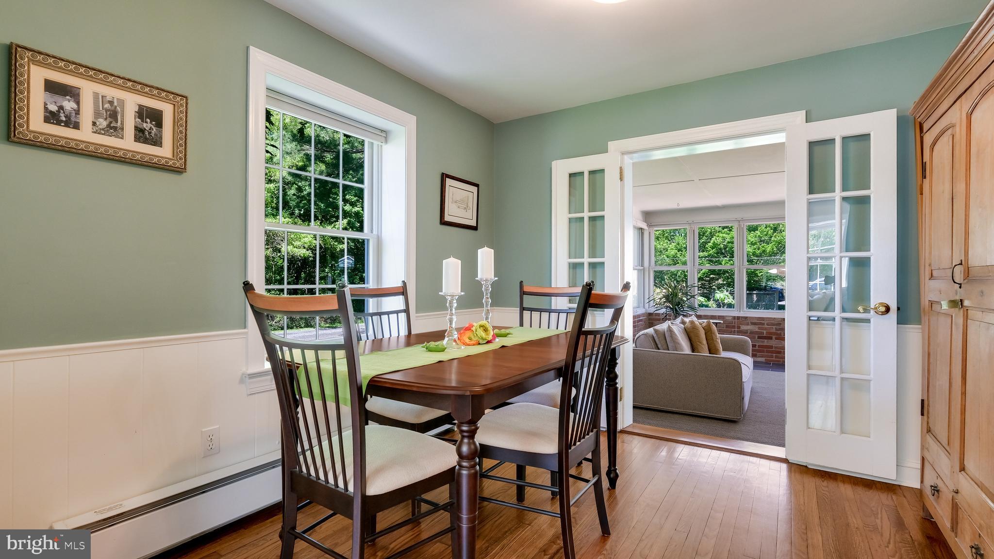 235 North Clinton Street Doylestown, PA 18901 - Photo 10 of 55 a view of a dining room with furniture and wooden floor